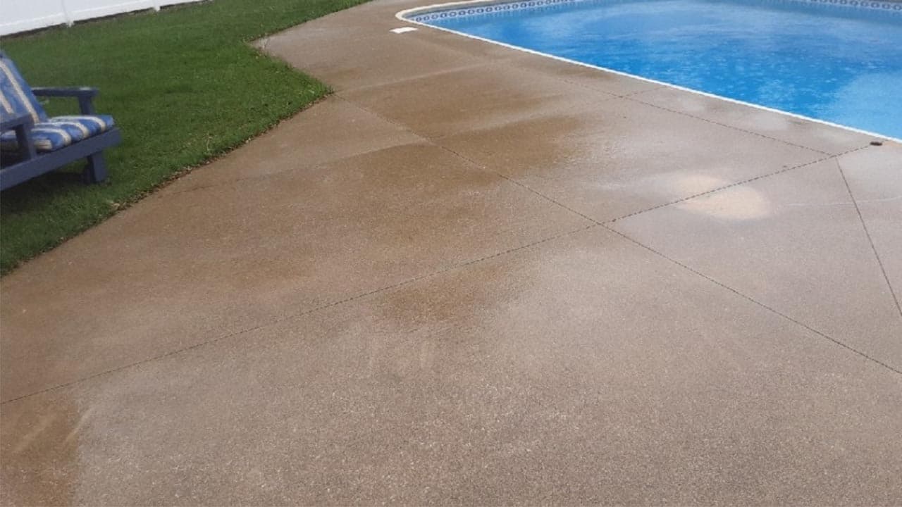 Pool deck pressure wash before and after